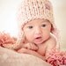 Little Knit Ear Flap Hat with Tassle for Baby with Shell Button in Pink or Blue