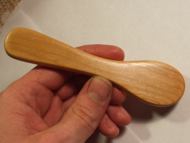Hand carved spoon teether in cherry wood