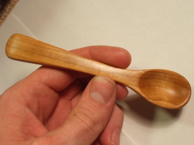 Hand carved baby spoon in rich cherry wood