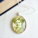 Dashing gentleman pendant necklace.  Made with illustration from vintage sheet music of mustache man