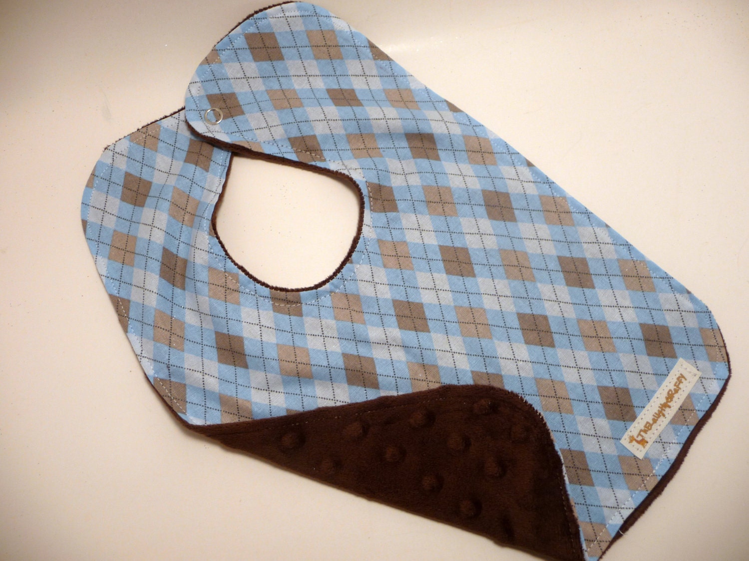 Tough in Brown and Blue Infant Bib