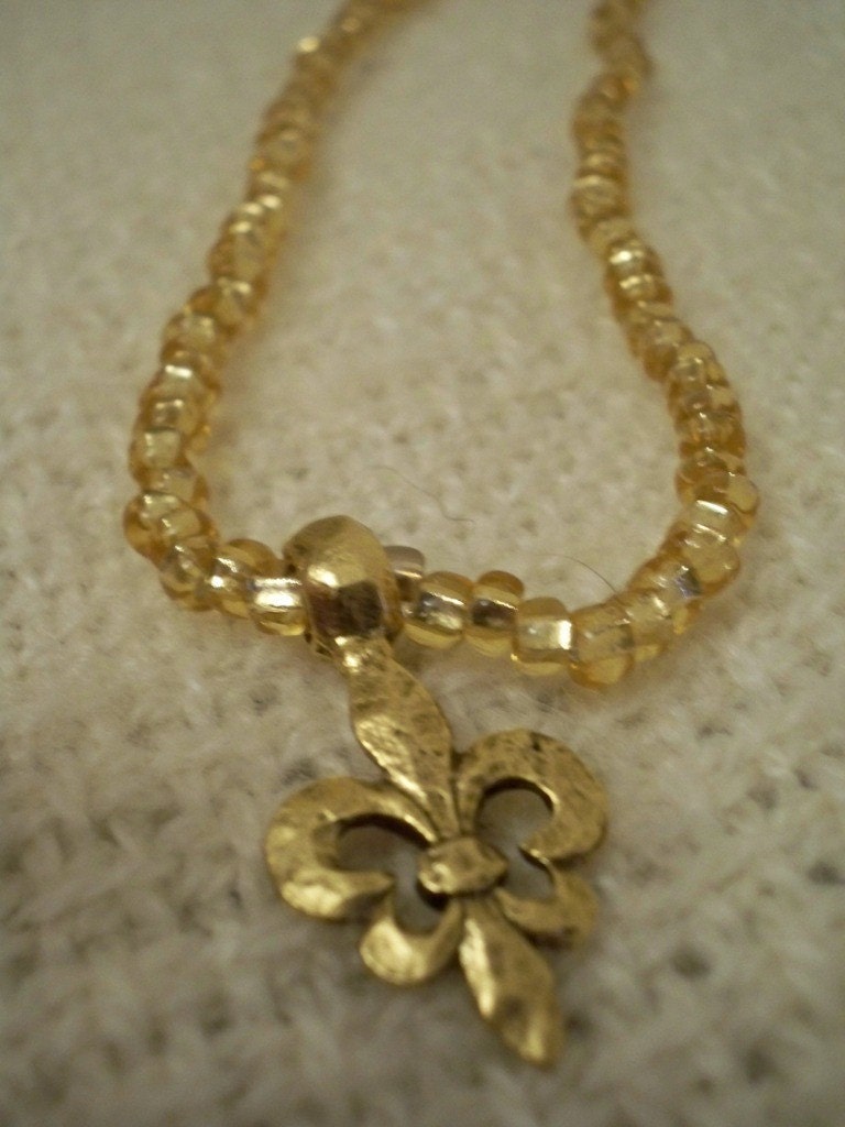 Gold Fleur De Lis Stretch Necklace
