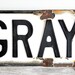 antique porcelain gray street signs