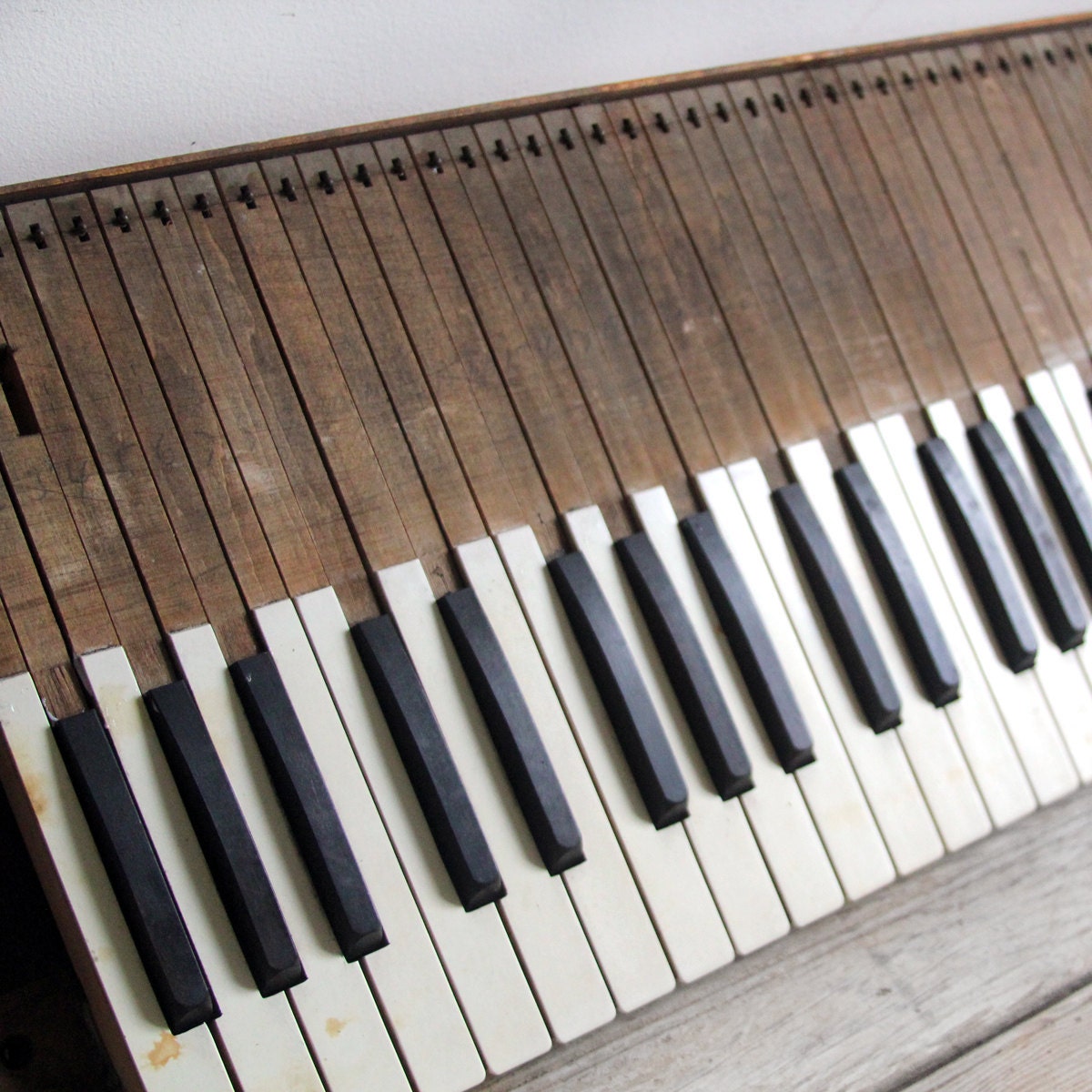 antique late 1800s wooden organ keyboard