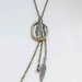 Tribal feather necklace: mixed metal silver and brass