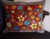 Folksy red flowery and faux wood fabric cushion