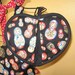 Russian Nesting Doll Matryoshka Apron and matching hot pad mitt with red and white polka dots