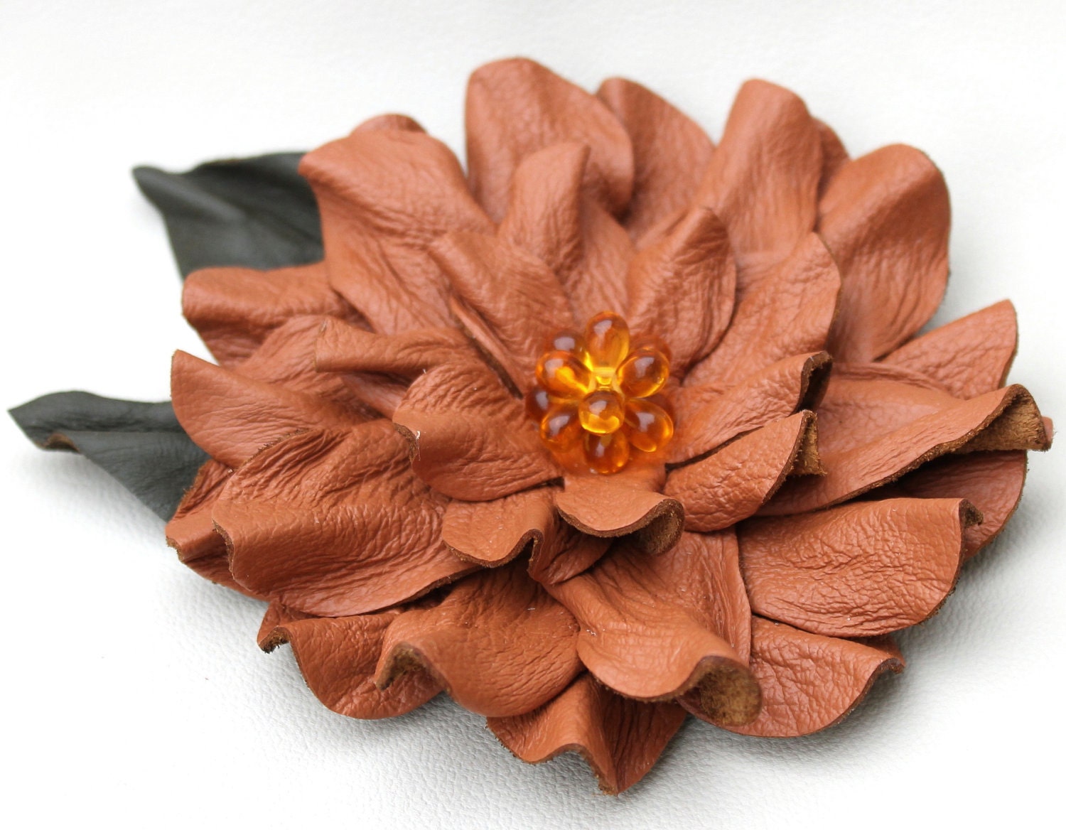 leather brooch