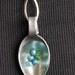 Blue bead and green glitter resin spoon necklace