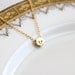 Tiny Gold Skull Necklace