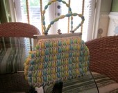 Cute multi-colored plastic handbag