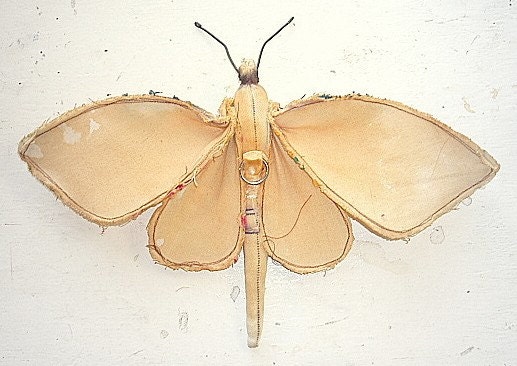 Moth made from vintage tablecloth.