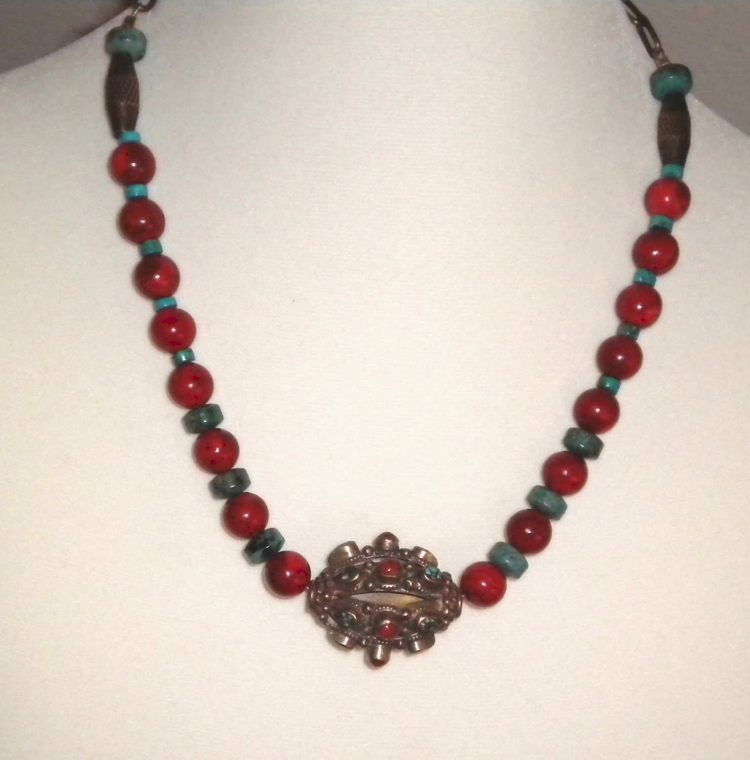 Turquoise, Red Sponge Coral, and Ornate Brass Focal Bead Necklace