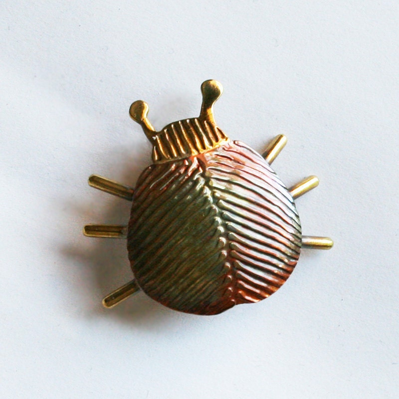 copper and brass bug or beetle brooch