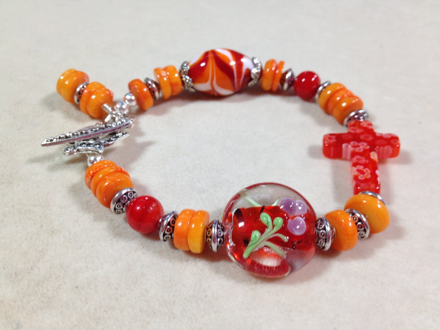 Tangerine Lampwork and Cross Bracelet - Orange, Tangerine & Red Bracelet with Lampwork, Furnace Glass and Coral