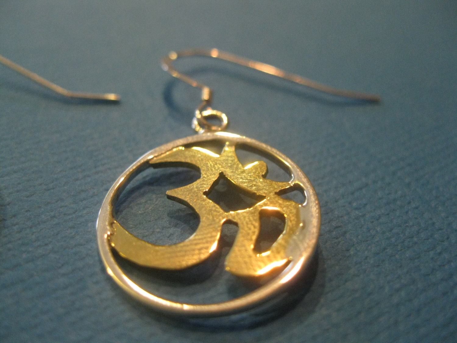 Sterling silver and brass ohm earrings