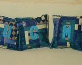 Set of decorative pillows with the inscription HUG ME