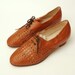 Size 10 Hand Woven Orange brown leather lace up heeled shoes Dead stock vintage
