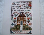 COMPLETED PRAIRIE SCHOOLER CROSS STITCH SAMPLER  -  JUNE