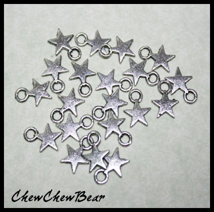 Tiny Silver Tone Stars 100 pcs 8x11mm