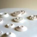 Custom order for Alissa: light gray and cream/white with some shimmer Edible Vintage Vanilla Candy Buttons 150
