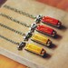 harmonica necklace (gold)