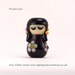 Purple glass doll bead