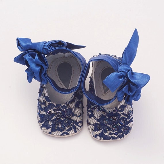 Baby booties in blue rose-appliquéd silk and lace covered leather