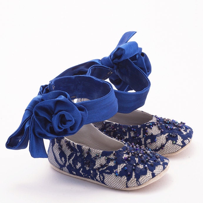 Baby booties in blue rose-appliquéd silk and lace covered leather