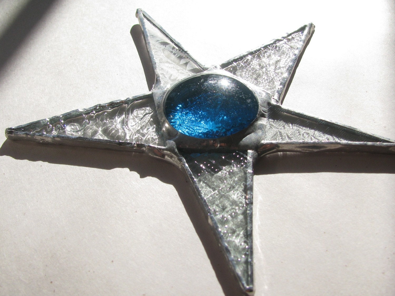 Five Inch Turquoise and Patterned Clear Glass Star