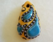 Paisley porcelain pendant, teardrop shape in yellow, blue, purple, orange and black