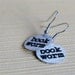 book worm earrings