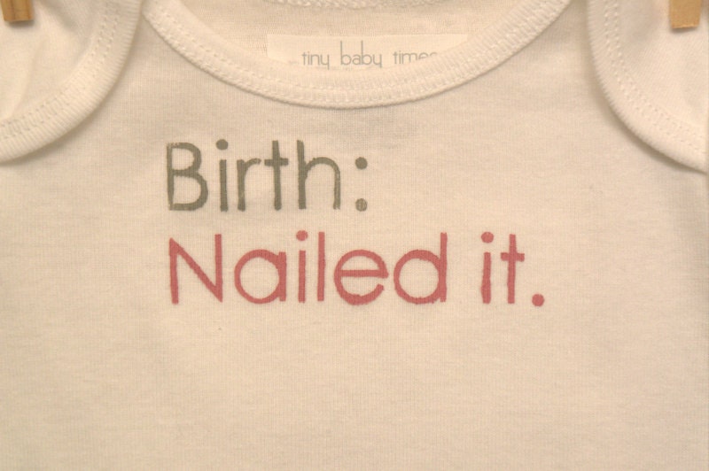 birth: nailed it --- white onesie, size 0-3 months --- pink