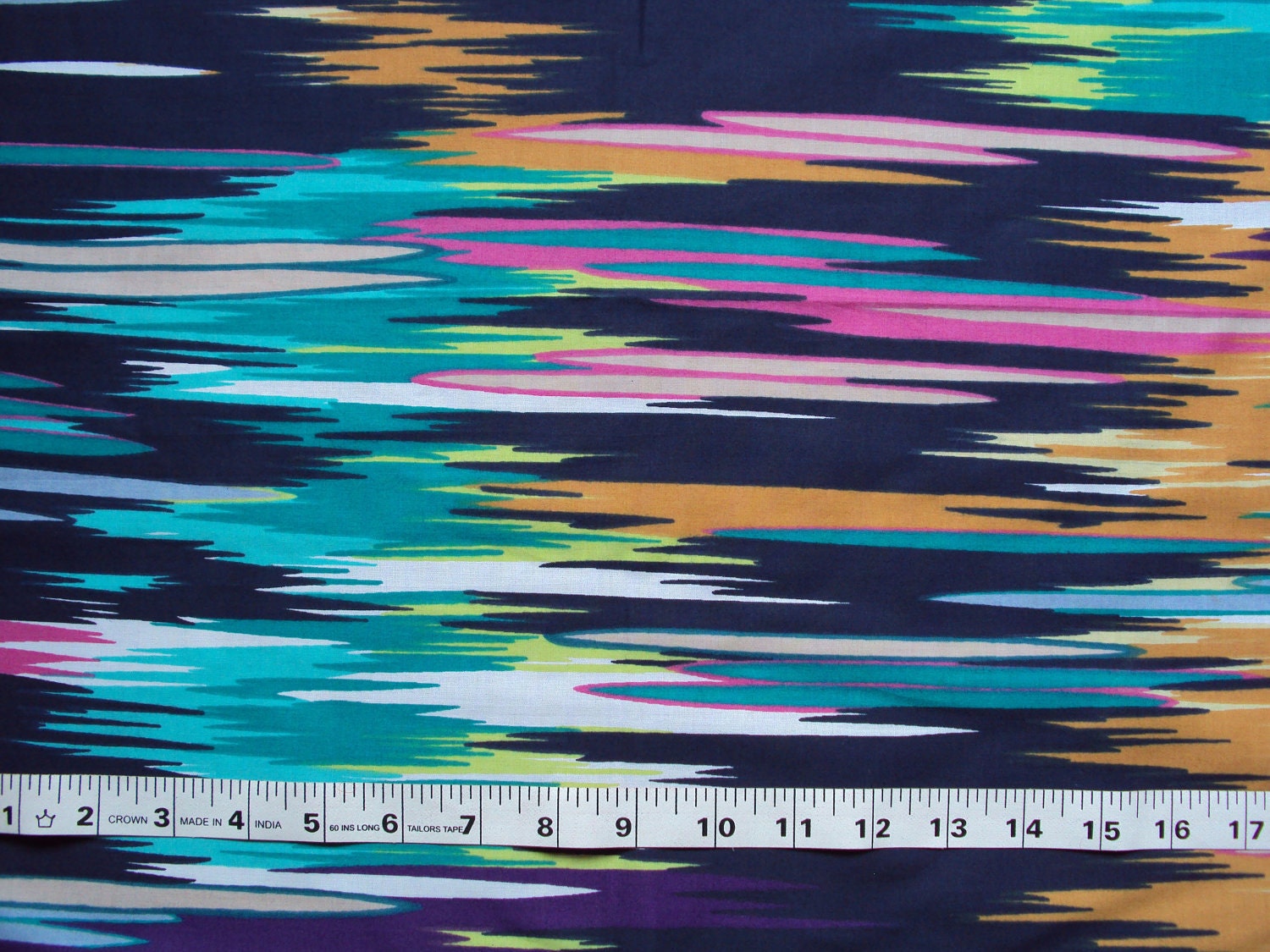 Cotton Fabric Print - Multi Colored On Navy Ikat Print 1 Yard
