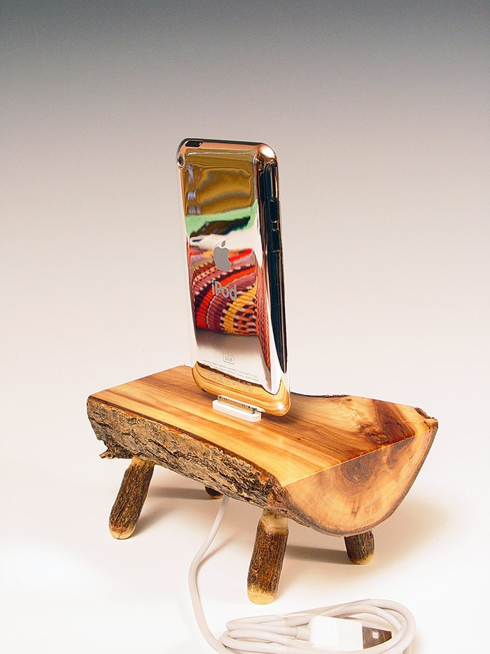 iPhone dock. iPod docking station. Table top memories of sitting around the camp fire making s'mores on a warm summer evening.