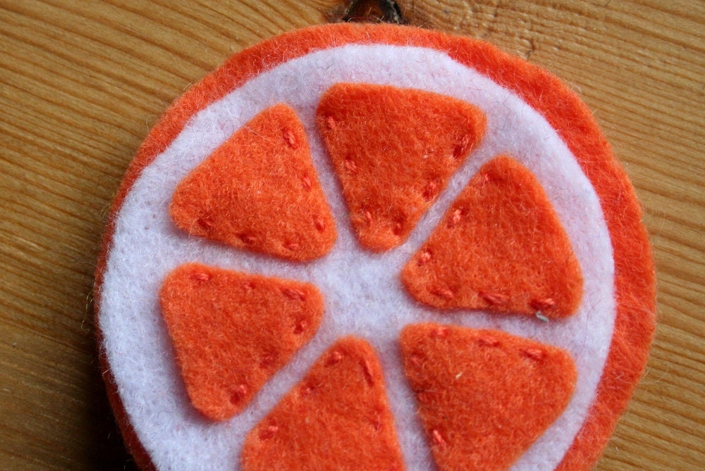orange citrus fruit pin