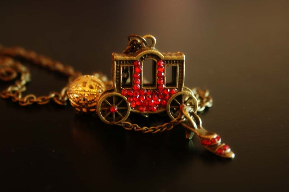 Princess carriage with her missing slipper at the royal ball necklace