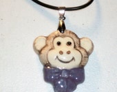 Monica Monkey Necklace  deep purple bow