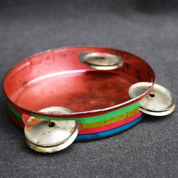 Fun colorful tambourine. Vintage collectible toy.