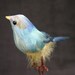 Little blue bird fly high