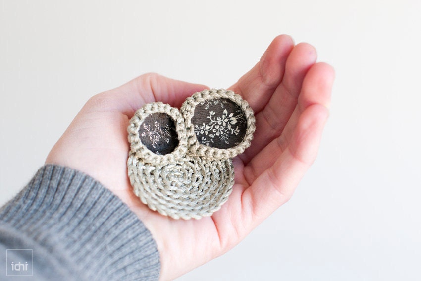 Brooch crochet circles with with fabrics. Beige.