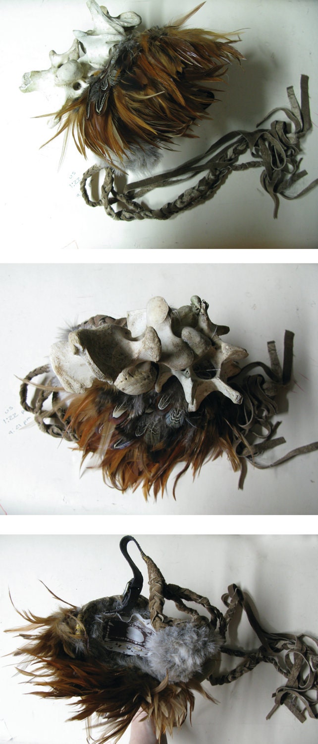 Cave girl cap. Leather fake fur, feathers and Vertebrae.