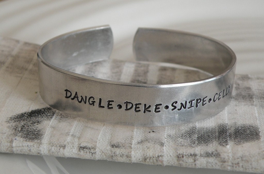 Dangle Deke Snipe Celly Aluminum Cuff Bracelet