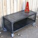 Handmade scrap metal media cabinet