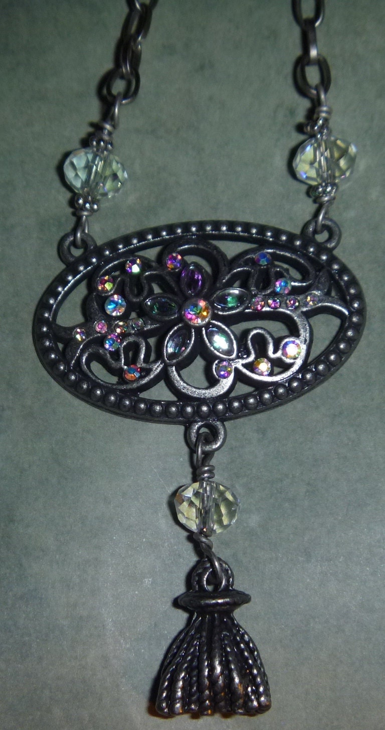 Silvertone floral and rhinestone crystal bead necklace with tassel