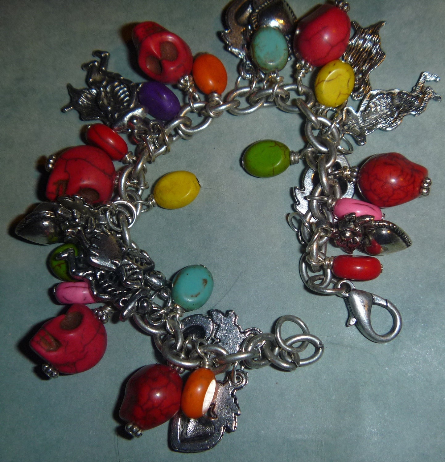 Day of the Dead Dia de los Muertos charm bracelet with red skull beads