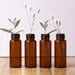 Four Lovely Small Brown Bottles
