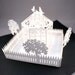 2 x popup card with birdcage and picket fence