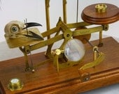 Original automaton entitled "Half ounce"