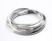 silver-gray leather wrap magnetic clasp bracelet with silver tube z473